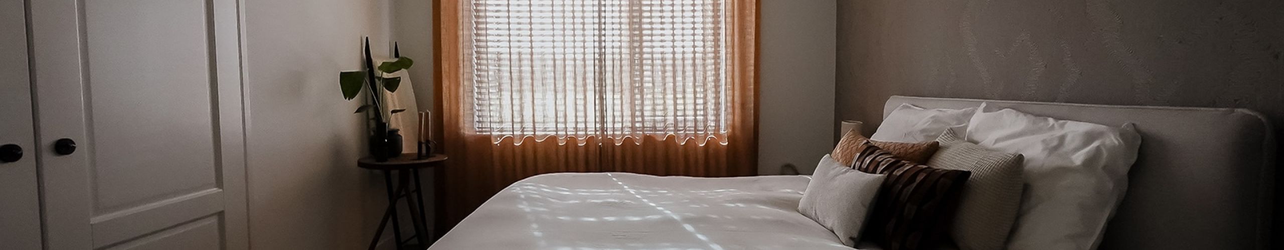 Raambekleding slaapkamer